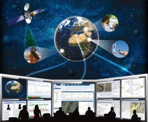A group of people sit in front of large screens displaying data and maps, with an image above showing Earth, a satellite, and various people using technology, all set against a starry background.