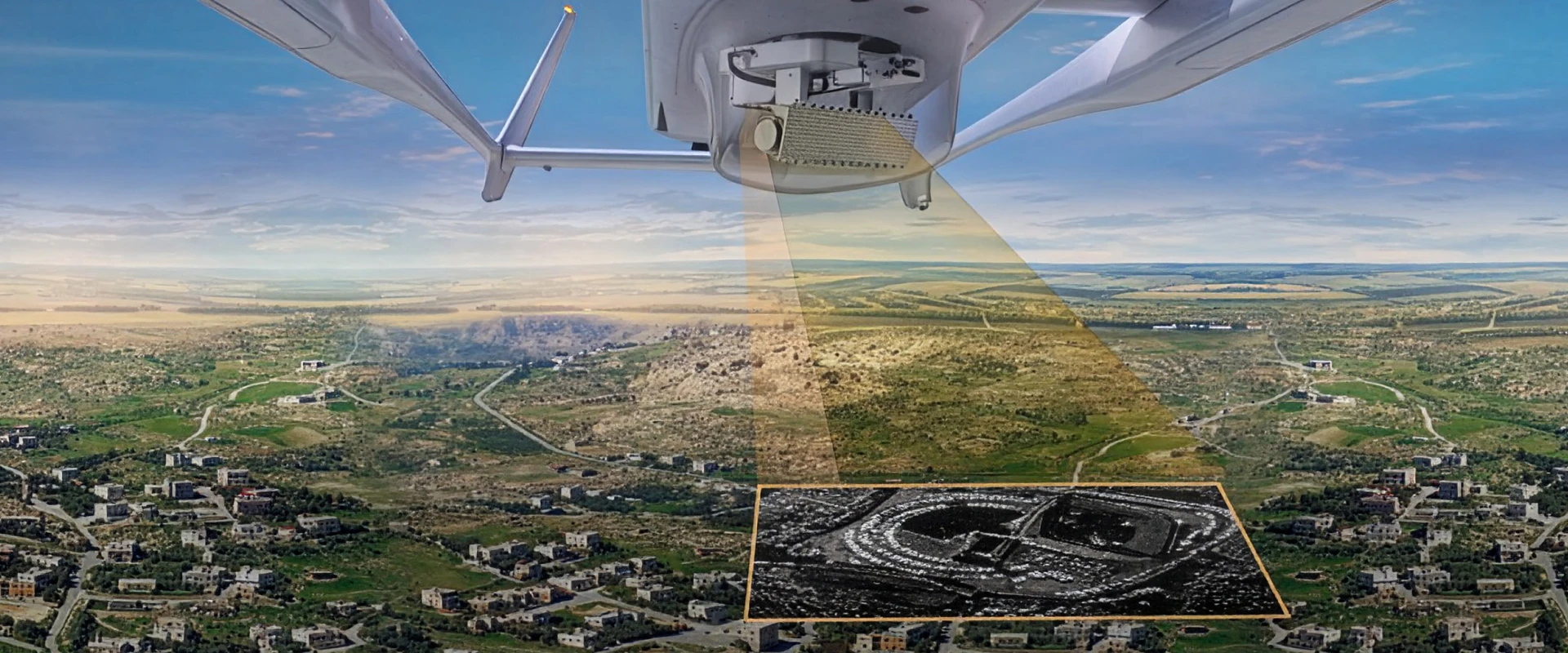 Aerial view from a drone scanning a landscape below; beams project down, as gmti radar highlights a detailed black-and-white surveillance image of a specific area on the ground.