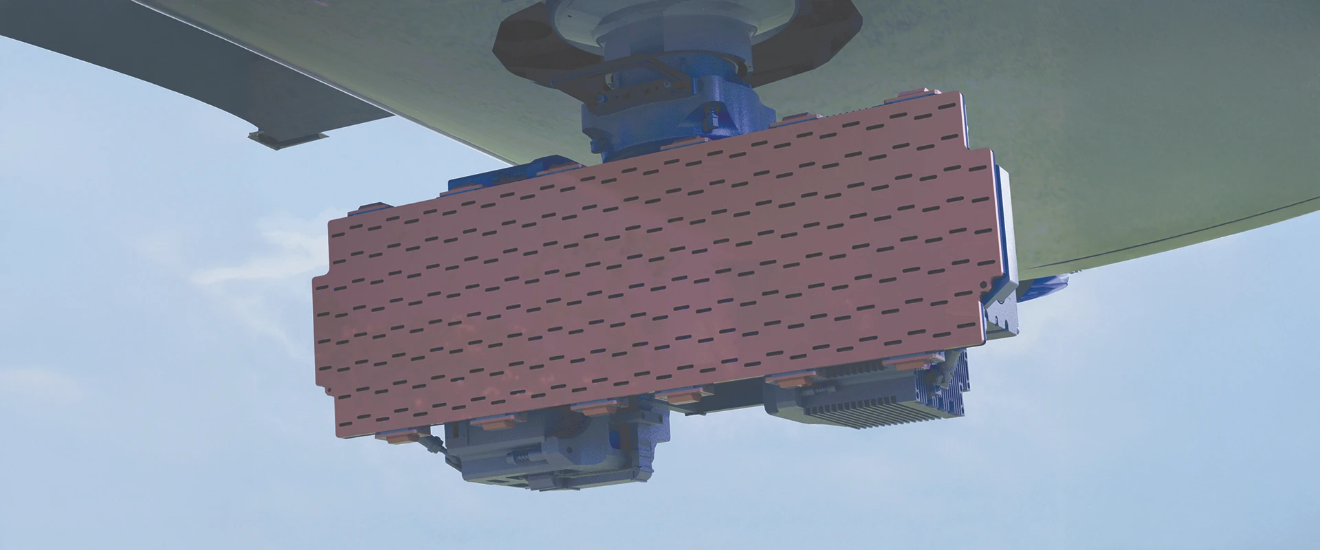 A close-up view of a large, rectangular, reddish-brown maritime surveillance radar array mounted beneath an aircraft, with visible blue mechanical components and a light sky in the background.