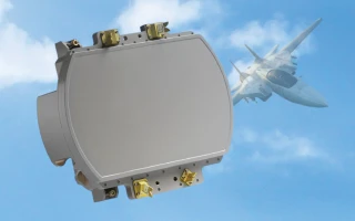 A close-up view of an aircraft radar system with a fighter jet flying in the blue sky with clouds in the background.