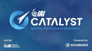 Logo for IAI CATALYST featuring a stylized rocket in a blue circle, the text “Igniting The Future of Innovation,” and the logos for IAI North America (led by) and Starburst (powered by) on a blue gradient background.