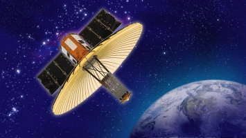 A satellite with large solar panels and a golden dish or reflector orbits above Earth against a backdrop of deep blue space and distant stars.