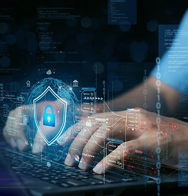 Hands typing on a laptop keyboard with a digital shield and padlock graphic overlay, representing cybersecurity and data protection, surrounded by abstract technology and code elements.
